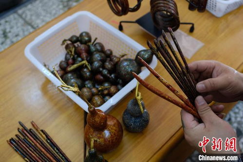 广西京剧小伙爱 国漆 朴实器物绘出绚丽色彩